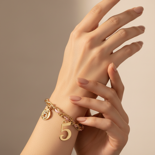 Bracciale in metallo tono oro e ecopelle rosa n. 5