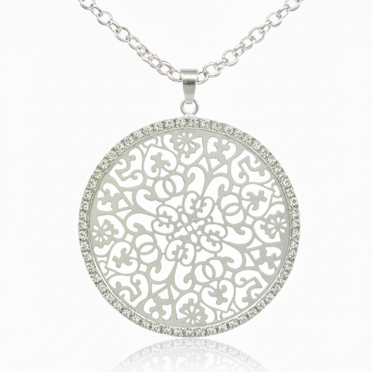 Long necklace with openwork round pendant with silver tone rhinestones