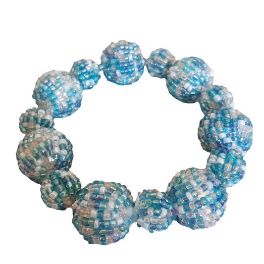 Bracciale elastico sfere di perline azzurro