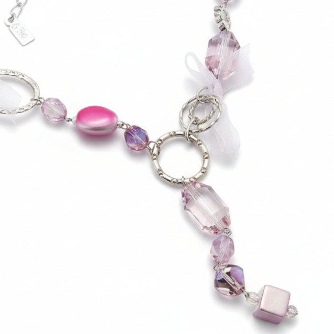 Long women's necklace in silver tone hypoallergenic metal with pink stones and bows