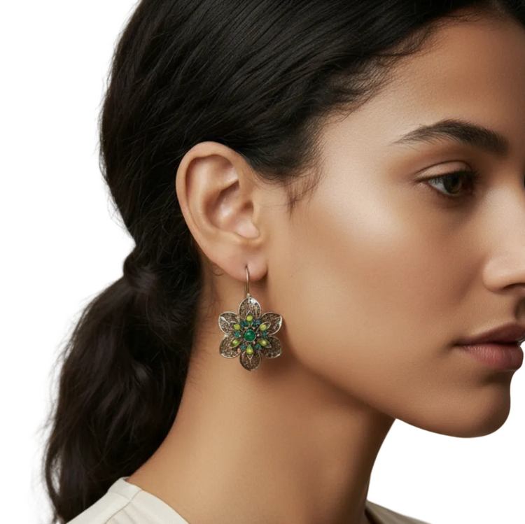antique gold tone flower earrings with rhinestones and green stones