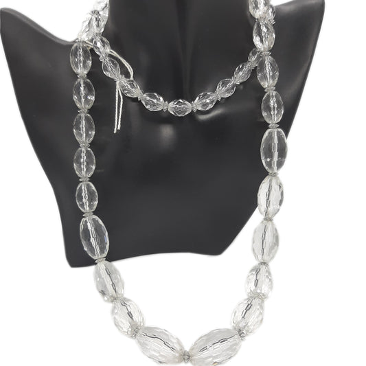 Long transparent faceted pearl necklace