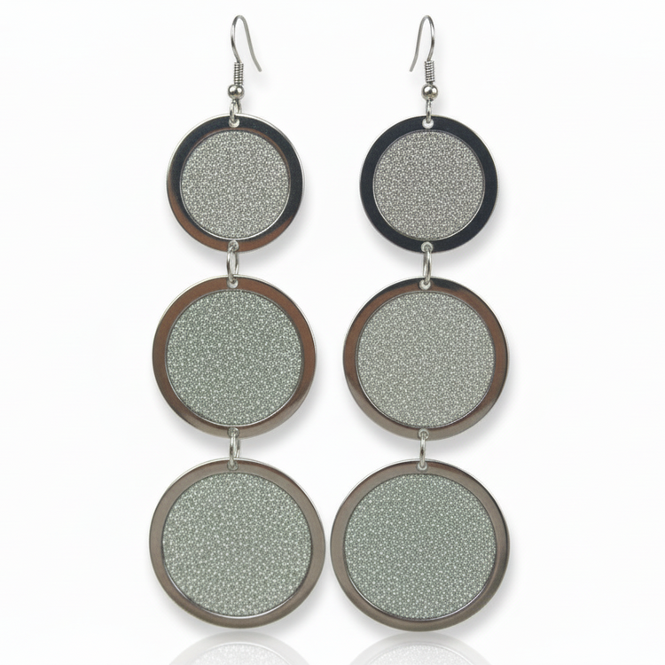 Long silver tone earrings with ROUND glitter