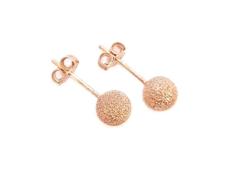 Orecchini a sfera in argento diamantato placcato oro rosa