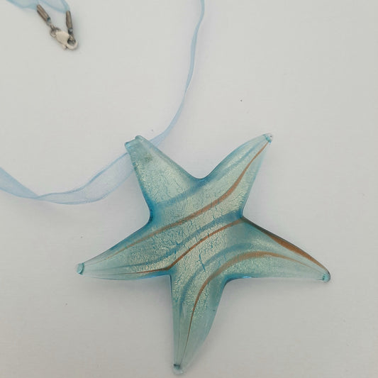 Starfish pendant necklace in blue glass