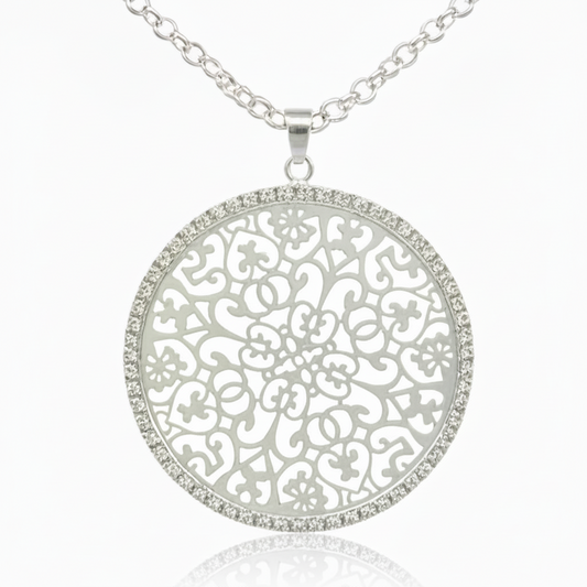 Long necklace with openwork round pendant with silver tone rhinestones