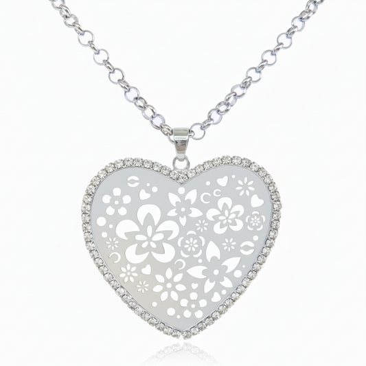 Long openwork heart pendant necklace with silver tone rhinestones