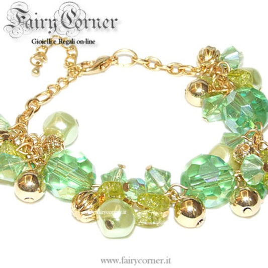 bracelet with gold tone charms, pearls and green faceted crystals