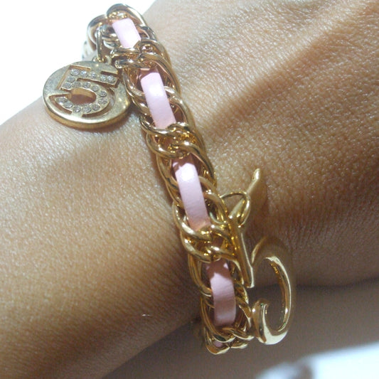 Gold tone metal and pink alcantara bracelet n. 5